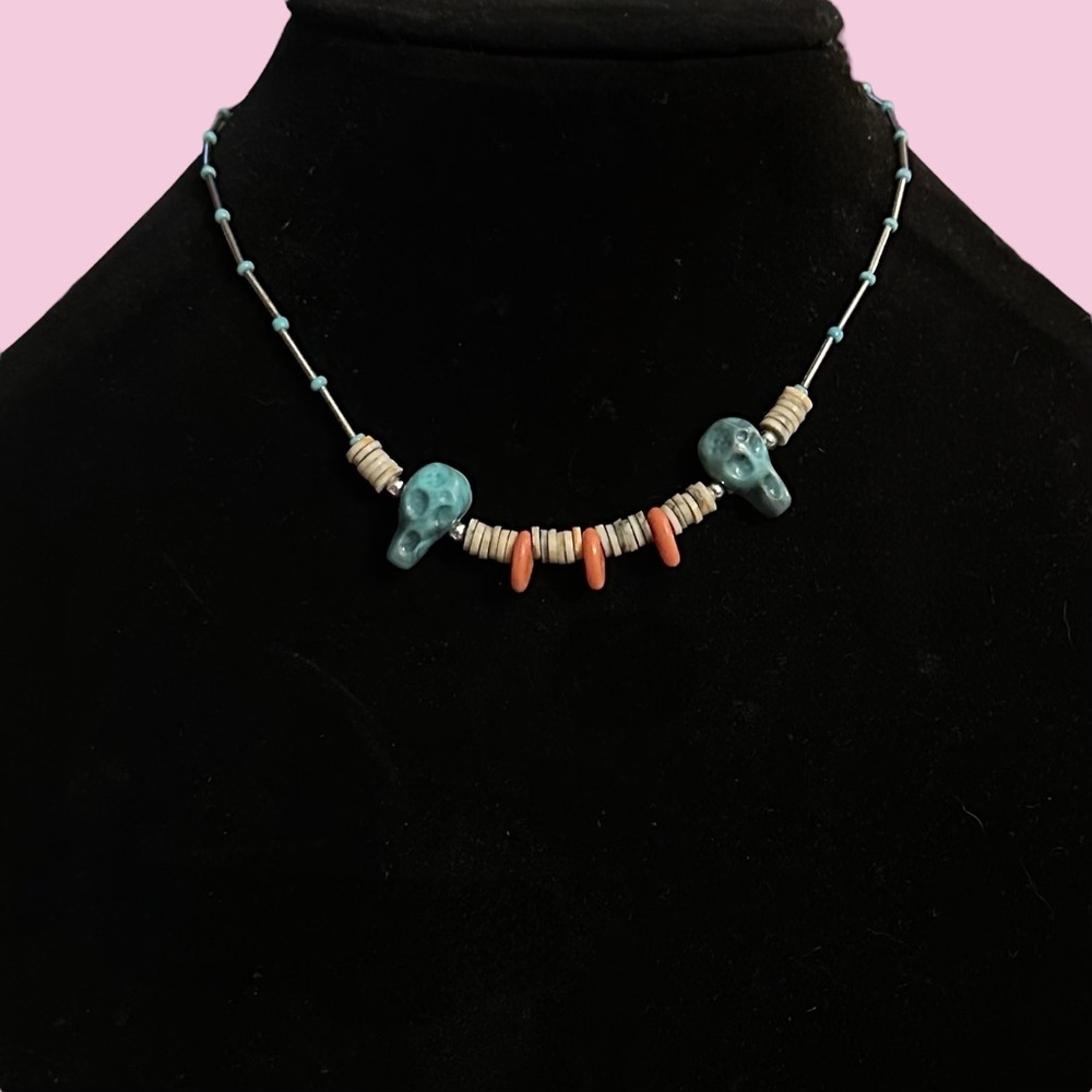 Vintage silver tone tribal skull shell bead necklace